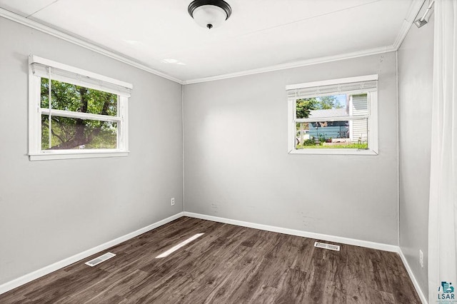 54 Banks Blvd, Silver Bay, MN 55614 - empty room featuring wood finished floors, ornamental molding, baseboards, and visible vents