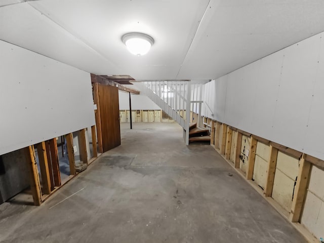 unfinished basement with stairway
