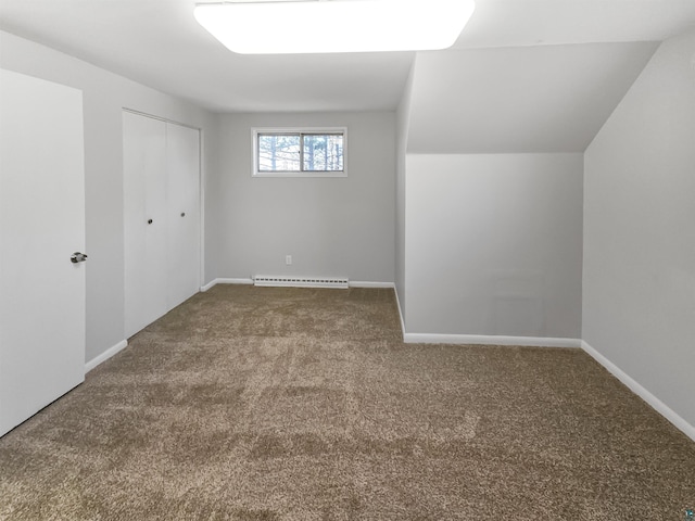 bonus room featuring carpet floors, baseboards, lofted ceiling, and baseboard heating