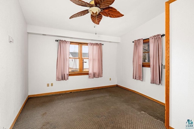 601 13th Ave, Two Harbors, MN 55616 - unfurnished room featuring carpet, baseboards, and a ceiling fan