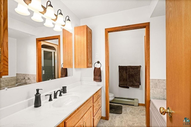 2755 County Road 1, Wrenshall, MN 55797 - full bath with a garden tub, a shower stall, vanity, toilet, and a baseboard radiator