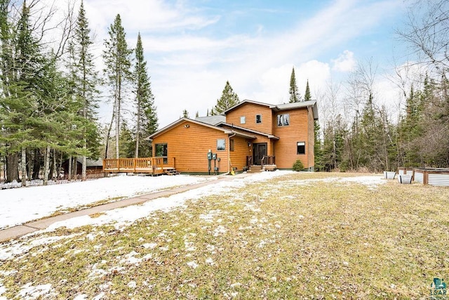 2755 County Road 1, Wrenshall, MN 55797 - rustic home featuring a deck
