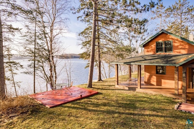 view of yard with a water view