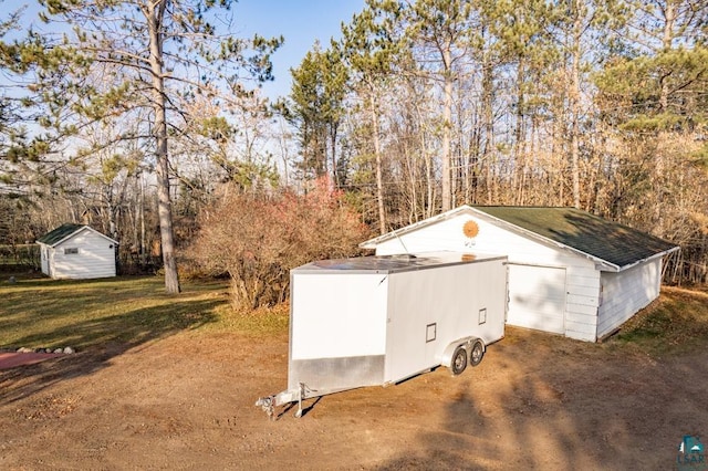 view of outbuilding with an outbuilding