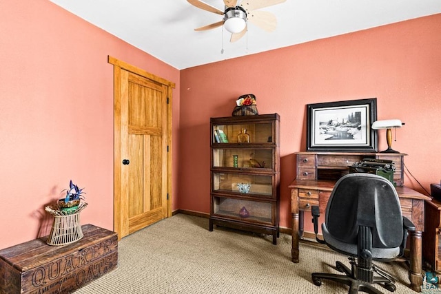 office area featuring carpet flooring and a ceiling fan