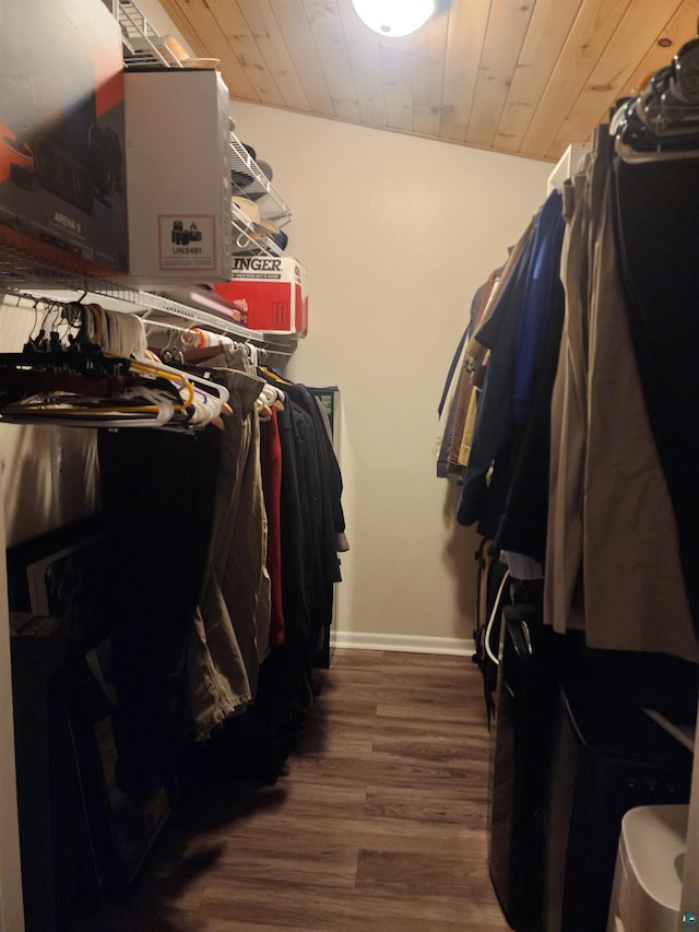 spacious closet featuring wood finished floors and lofted ceiling