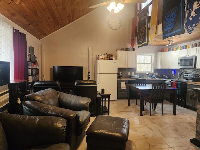 living area with crown molding, marble finish floor, wooden ceiling, a ceiling fan, and vaulted ceiling
