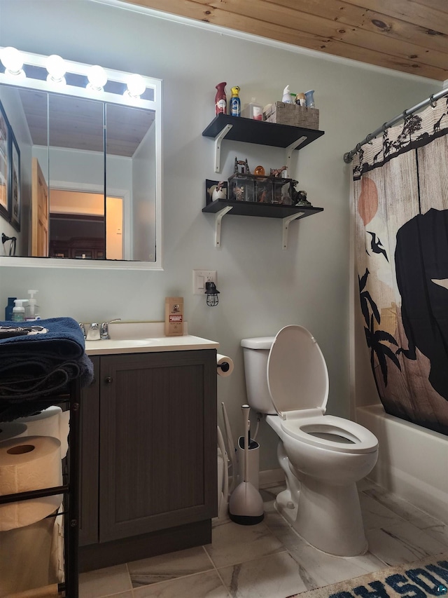 bathroom featuring vanity, toilet, and shower / tub combo with curtain