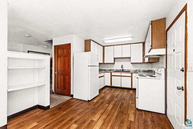 kitchen featuring a sink, white cabinets, white appliances, and dark wood-style floors