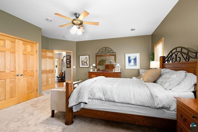 bedroom with carpet flooring and a ceiling fan
