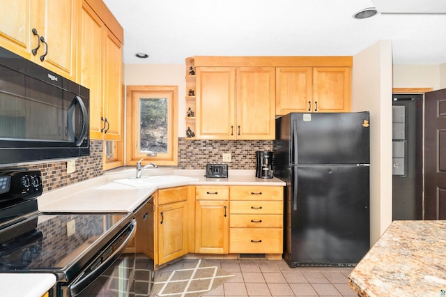 kitchen featuring open shelves, tasteful backsplash, a sink, and black appliances