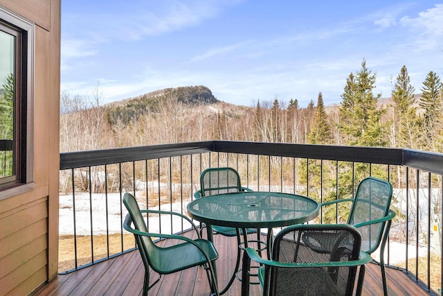 balcony featuring a mountain view