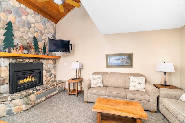 living room featuring ceiling fan, a fireplace, carpet, wooden ceiling, and lofted ceiling