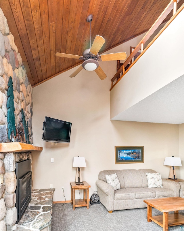 living room with vaulted ceiling, carpet floors, wood ceiling, and ceiling fan