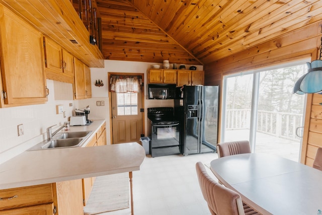 kitchen featuring light floors, light countertops, wooden ceiling, a sink, and black appliances