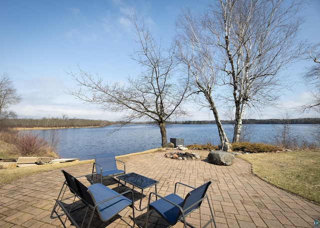 view of patio featuring a water view