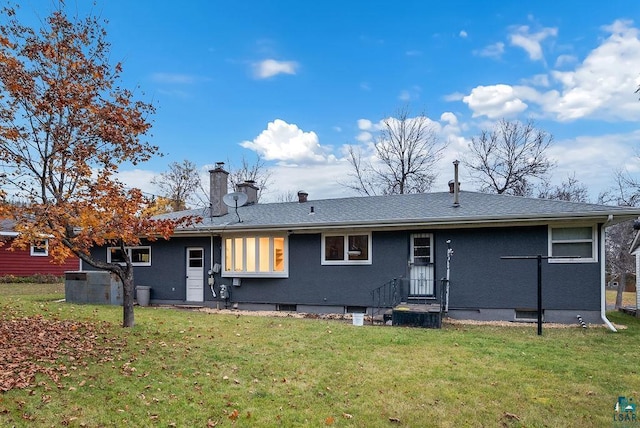 64 Hays Crk, Silver Bay, MN 55614 - back of house featuring a chimney and a yard