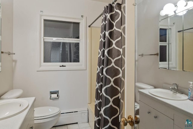 64 Hays Crk, Silver Bay, MN 55614 - full bath with vanity, toilet, baseboard heating, and a shower with curtain