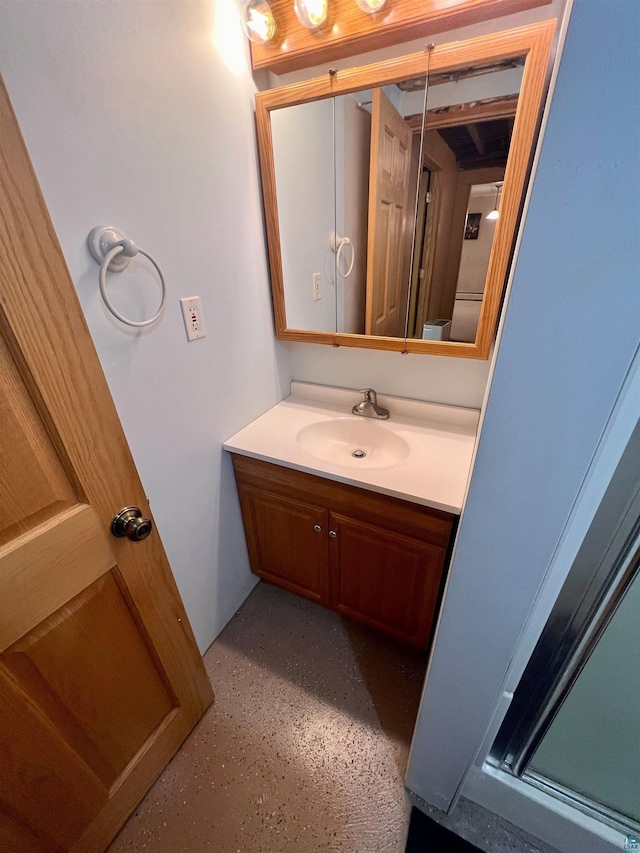 full bathroom featuring an enclosed shower and vanity