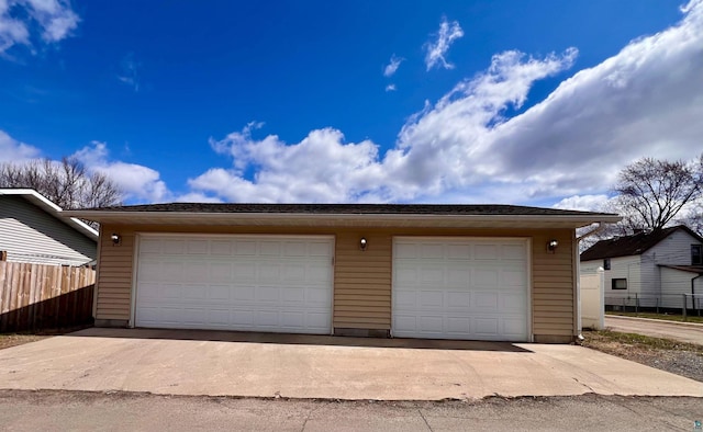 detached garage with fence