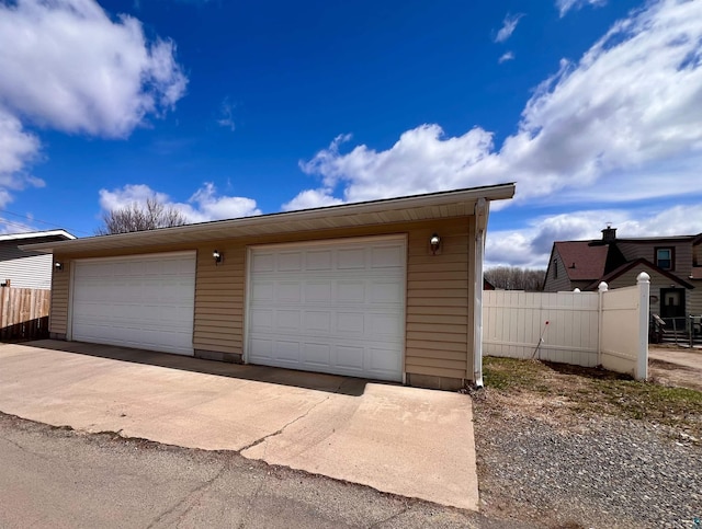 detached garage with fence