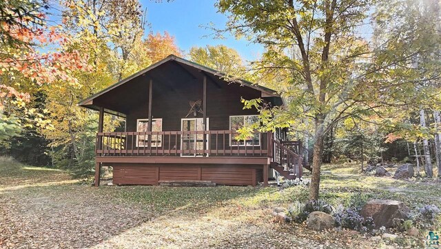 exterior space featuring a wooden deck