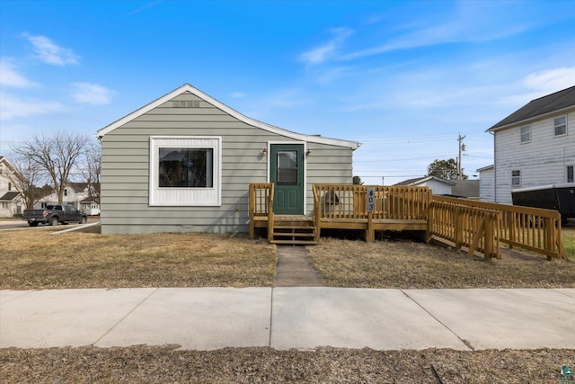 view of front of property with a deck