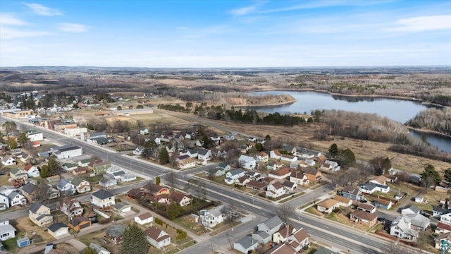 aerial view featuring a residential view and a water view