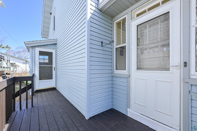 doorway to property featuring a deck