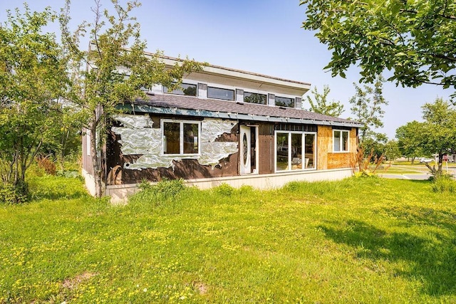 40 Nelson Dr, Silver Bay, MN 55614 - back of property with a lawn