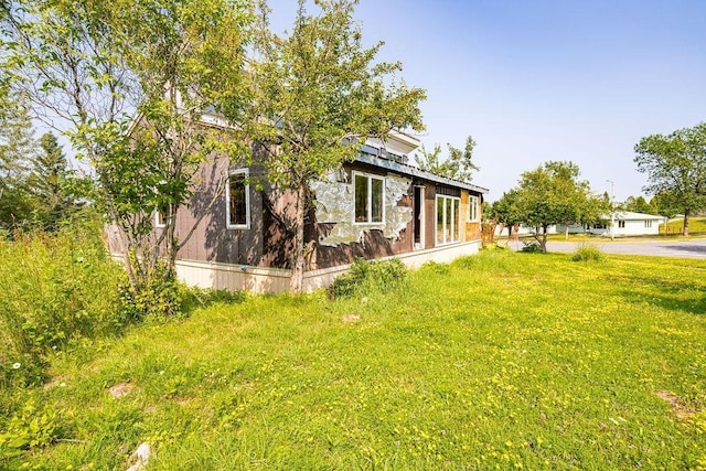 40 Nelson Dr, Silver Bay, MN 55614 - view of side of property featuring a lawn