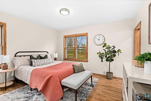bedroom featuring wood finished floors