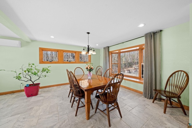 dining room with baseboards, recessed lighting, an inviting chandelier, stone tile floors, and a wall unit AC
