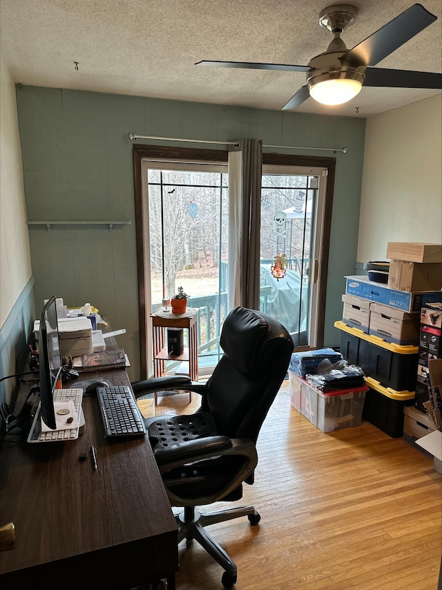 3824 Rehbein Rd, Duluth, MN 55803 - office area with a textured ceiling, ceiling fan, and wood finished floors