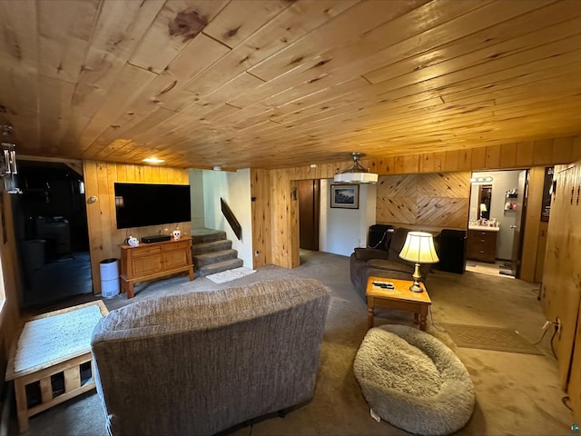 3824 Rehbein Rd, Duluth, MN 55803 - living area with carpet floors, wood walls, wood ceiling, and stairway