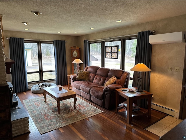 3824 Rehbein Rd, Duluth, MN 55803 - living room featuring a baseboard radiator, an AC wall unit, hardwood / wood-style flooring, and a textured ceiling