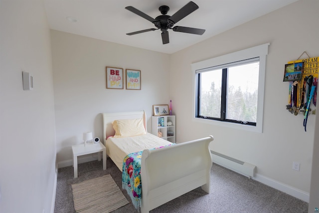 carpeted bedroom featuring baseboards, a baseboard radiator, and a ceiling fan