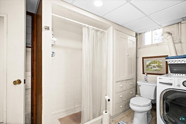 washroom with washer / clothes dryer and laundry area