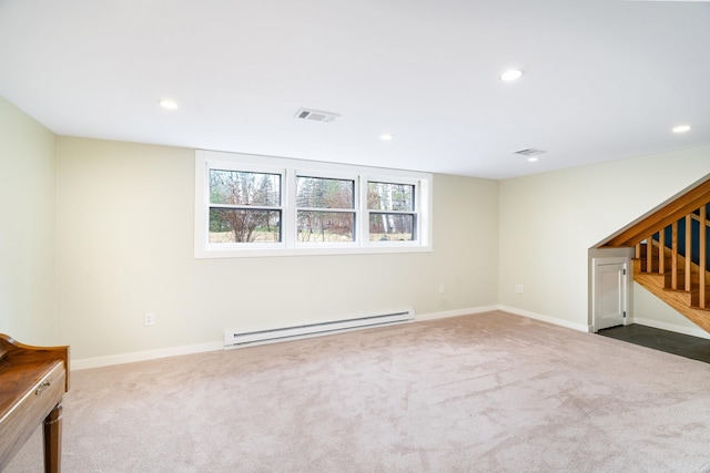 unfurnished living room with carpet flooring, recessed lighting, stairs, and a baseboard radiator