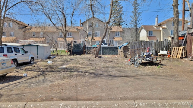 1441 90th Ave W, Duluth, MN 55808 - view of yard with fence and a residential view
