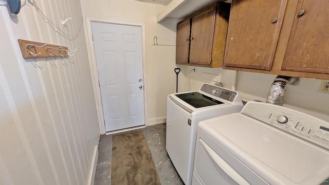 1441 90th Ave W, Duluth, MN 55808 - clothes washing area with independent washer and dryer and cabinet space