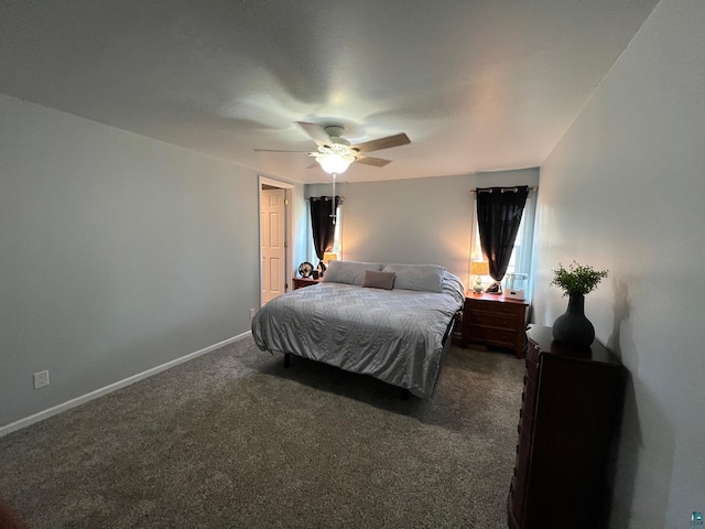 bedroom featuring a ceiling fan, baseboards, and dark carpet