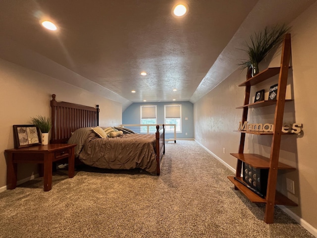 carpeted bedroom with baseboards, recessed lighting, and vaulted ceiling