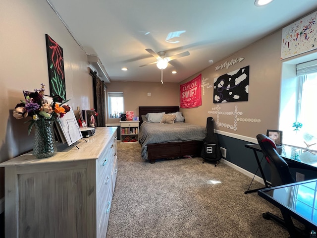 bedroom with recessed lighting, ceiling fan, multiple windows, and light carpet