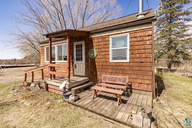 13005 Cass St, Duluth, MN 55808 - exterior space featuring fence and a shingled roof