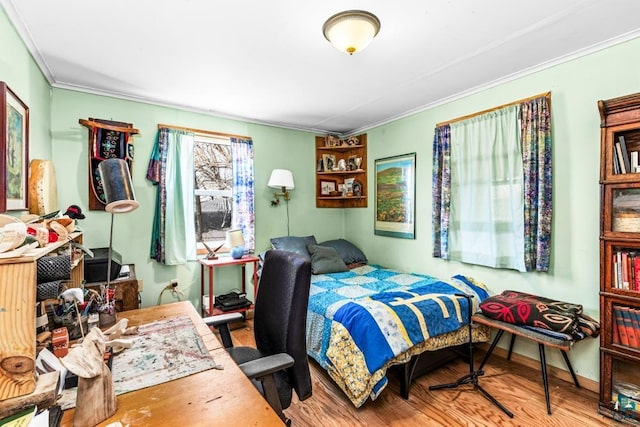 13005 Cass St, Duluth, MN 55808 - bedroom featuring crown molding and wood finished floors
