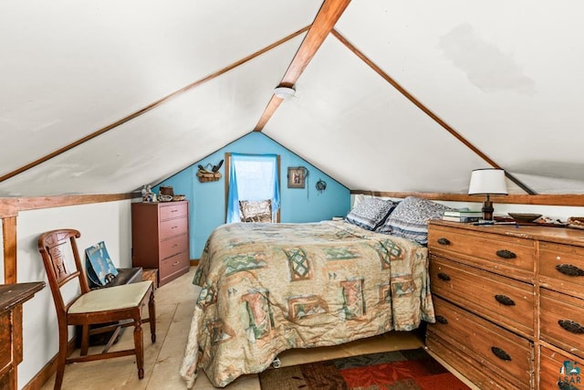 bedroom with lofted ceiling