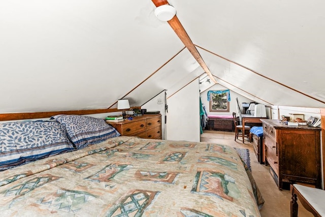bedroom with lofted ceiling