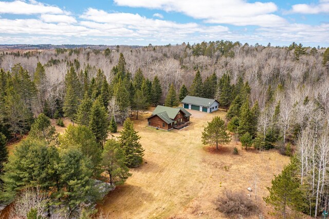 aerial view with a wooded view