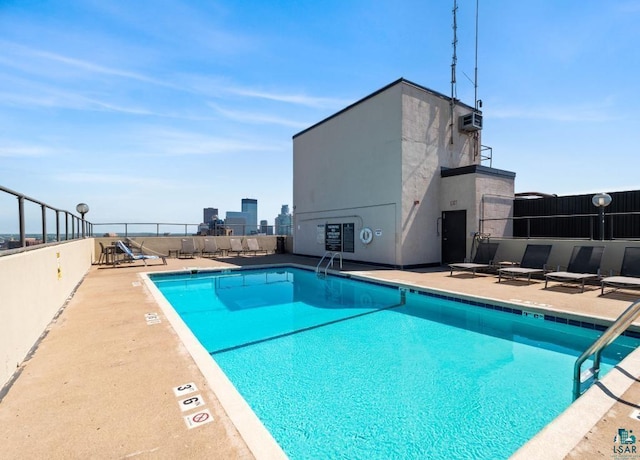 410 Groveland Ave Unit 1203, Minneapolis, MN 55403 - pool featuring fence and a patio